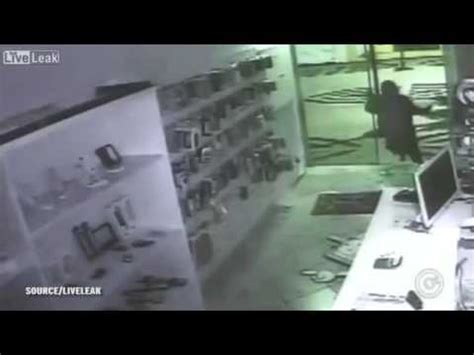 Painful Moment Hapless Thief FACEPLANTS Into Glass Door As He Tries To