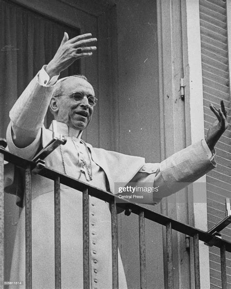 Pope Pius Xii Raising His Hands To Bless The Crowd From His Balcony