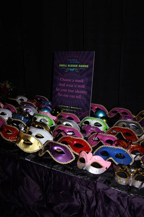 a table of masks was set for guests to choose their disguise for the evening sweet 16 masquerade