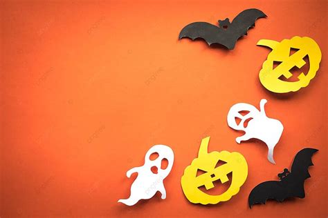 Halloween Paper Cutout Background With Pumpkins Ghosts And Bats Photo
