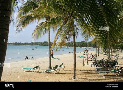 Relaxing On Bloody Bay Beach Jamaica Stock Photo Alamy