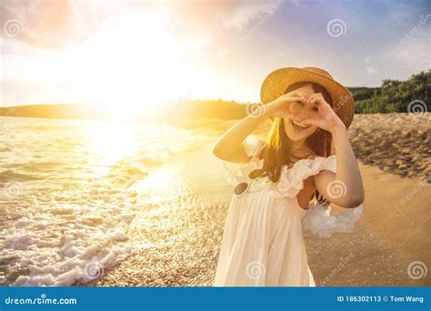 Heart Gesture In Front Of Sunset Above River Summer Memories Concept