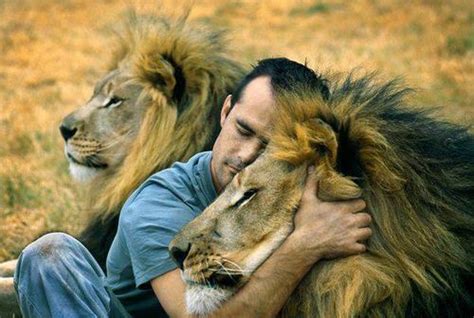 Man Hugs Lion And Its Pretty Much What We Wish We Were All Doing