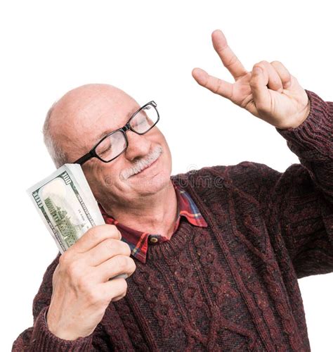 Senior Man Holding A Stack Of Money Portrait Of An Excited Old
