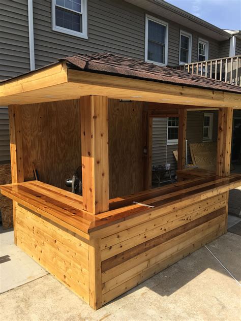 The soapstone countertop is 36″ high. garden shed ideas diy #gardenshedideasdiy | Backyard bar, Outdoor kitchen bars, Outdoor remodel