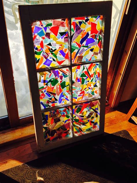 my newest window made with scrap stained glass and pour over epoxy glass window art stained