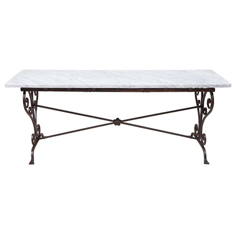 The best way to tie your room together is with a stylish coffee table. Antique Wrought-Iron/Marble Coffee Table at 1stdibs
