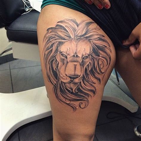 Black Ink Thigh Tattoo Of Realistic Lion Head Tattooimages Biz