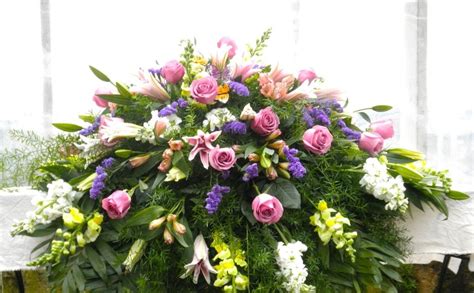 Diy closed casket mixed flowers arrangement.materials used:50 mixed colors roses5 white hydrangea 20. Mixed Casket Spray | Funeral Flowers in Lexington, KY ...