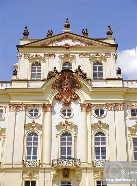 The Rococo Facade Of The Archbishops Palace Prague Czech Republic