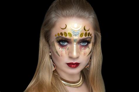 New Creative Make Up Conceptual Idea For Halloween Golden Woman Stock