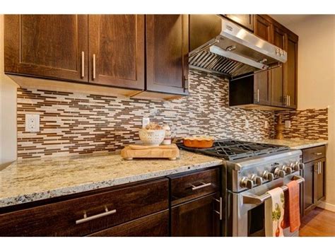 Our facility in marysville, wa, is your customer cabinetry shop. The cabinets are stained in Java and the kitchen has full tile backsplash. Appliances are ...