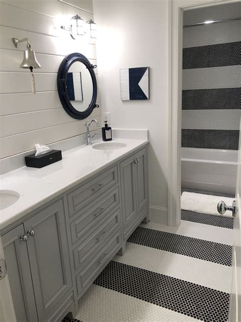 Sparkling metallic penny tile backsplash. Kids bath - penny round tile in navy and white stripes ...