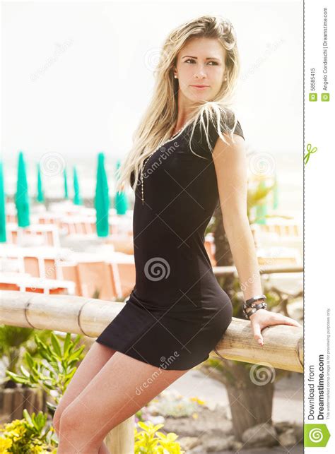 Beautiful Blonde Girl Perfect Body In Black Dress Outdoor Summer Stock