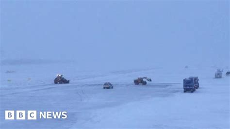 Bristol Airport Workers Clear Runway Of Snow Bbc News