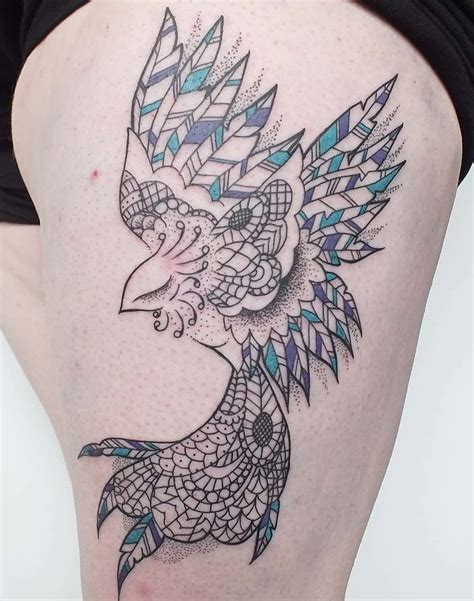 Watercolor phoenix tattoo on left back shoulder. Watercolor Phoenix Tattoo Ideas - Flawssy
