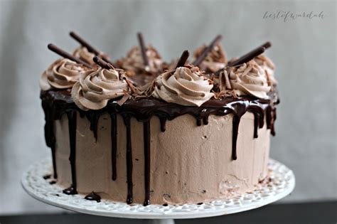 Eggless chocolate mousse cake with an eggless cake topped with a light chocolate mousse and finished with a chocolate ganache. Triple Layer Chocolate and Mousse Cake | Best of Wardah