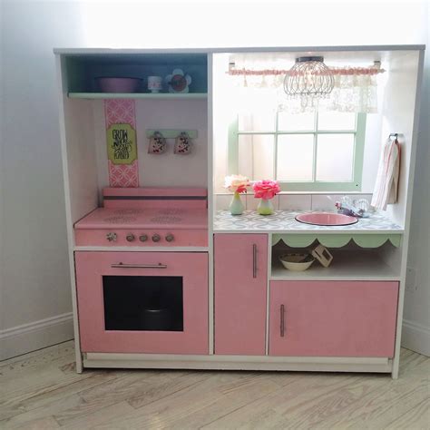 Diy Play Kitchen Made From Old Entertainment Center Play Kitchen Diy Toy Kitchen Wooden