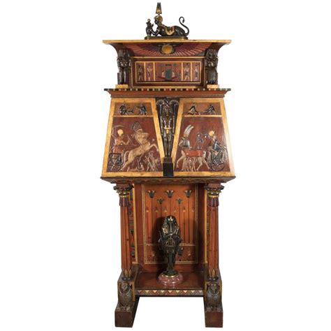 Traditionally, four factors of influence over the creative activity of the artist can be distinguished: Art Deco Egyptian Revival Secretaire with Gilded Detailing ...
