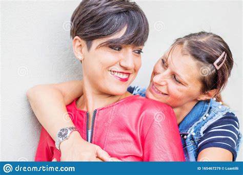 Happy Playful Girlfriends In Love Sharing Time Together Stock Image