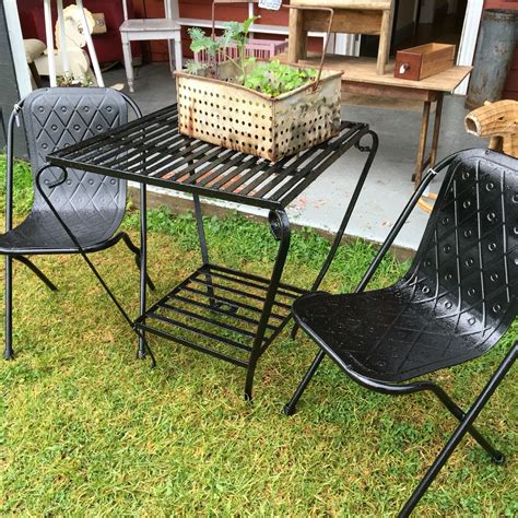 The upholstery is an aqua striped velvet, in excellent condition. Vintage Sebel chairs paired with cast iron table at Rust ...