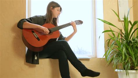 Teen Girl Playing Guitar Stock Footage Video 3358688 Shutterstock
