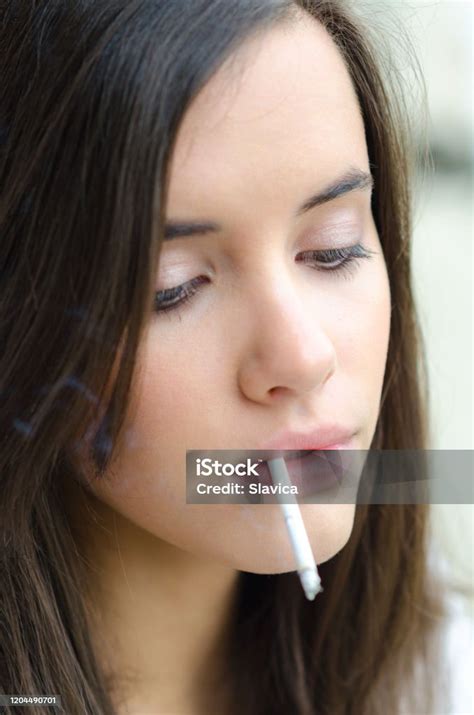 Woman Smoking Cigarette Stock Photo Download Image Now 20 29 Years