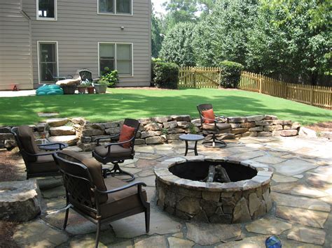 Tennessee Stack Fieldstone Retaining Wall And Flagstone Patio With Fire