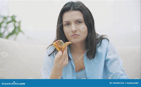 Slowmo Close Up Of Adorable Woman Who Is Chewing A Piece Of Pizza And Shifting Emotions Yummy