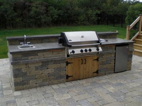 Check spelling or type a new query. An outdoor kitchen with Napoleon grill, sink, and fridge ...