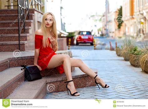 Woman In Red Dress Sitting On The Stairs Stock Image Image Of Street