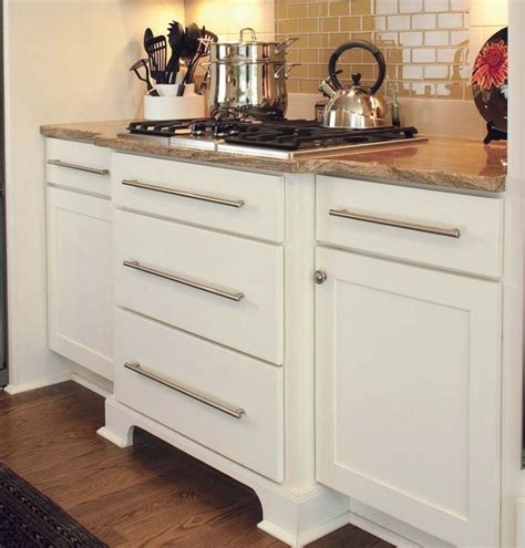 I saw some cool kitchen drawers that you can install inside your cabinets at lowes a while back and thought it would be a good way to get a little bit more organized. White shaker cabinets with slab drawer fronts used to ...