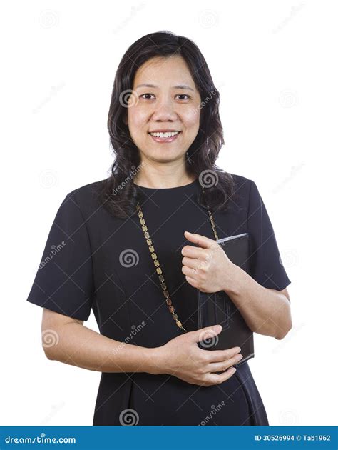Созрейте азиатская женщина в одежде дела на белой предпосылке Стоковое