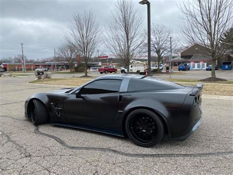 C6 Corvette With Loma Gt2 Widebody Kit And Thule Roof Box Puts Down 715