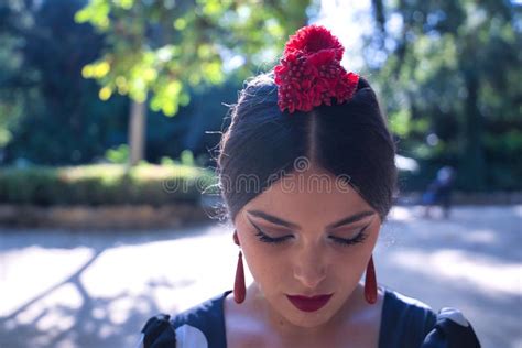 Detail Of Hairstyle Earrings Of Young Woman Flamenco Artist Brunette