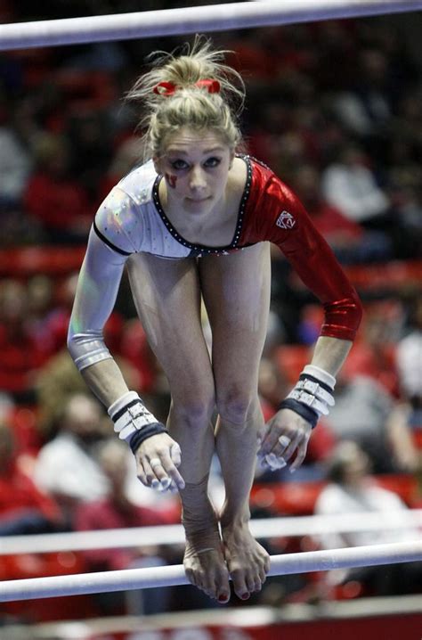 utah red rocks gymnast sabrina schwab performs in the uneven bars routine during an ncaa