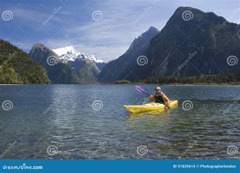 Man Kayaking In Mountain Lake Stock Photo Image Of Attractive People