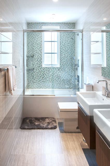 Here, waterworks has switched tile direction to shake up a classic brickwork installation, without going overboard. 18 Functional Design Ideas for Small Bathrooms