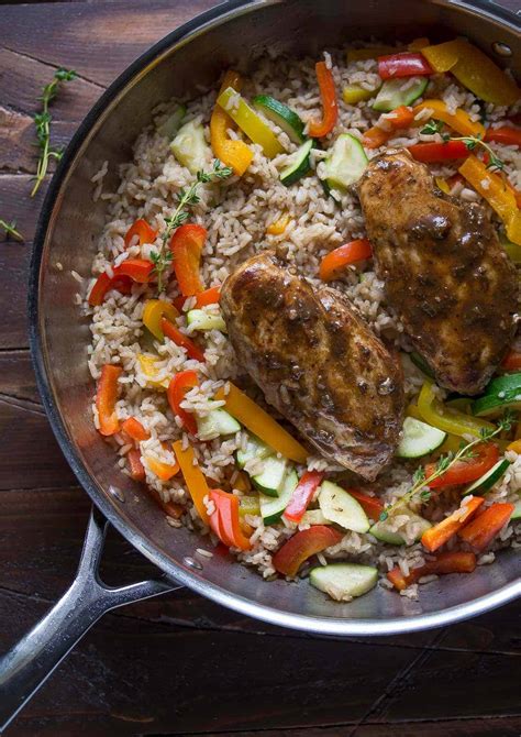 A savory recipe for chicken thighs and brown rice for your instant pot. One Pot Caribbean Chicken and Rice Recipe