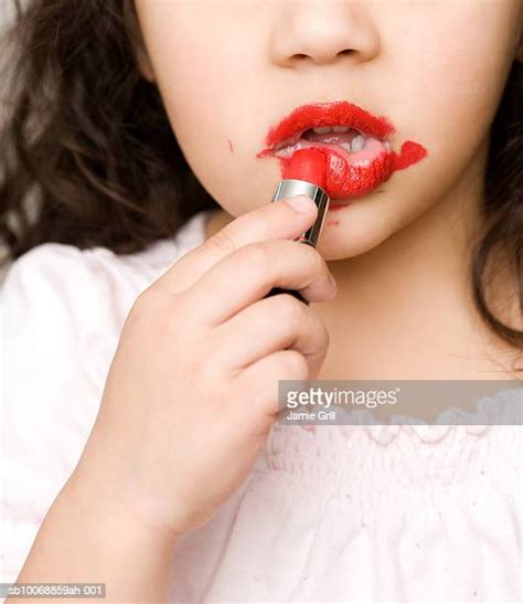 Girl Messy Lipstick Photos Et Images De Collection Getty Images