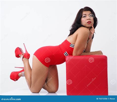 Pretty Woman Kneeling On The Floor Wears Rompers Stock Photo Image Of
