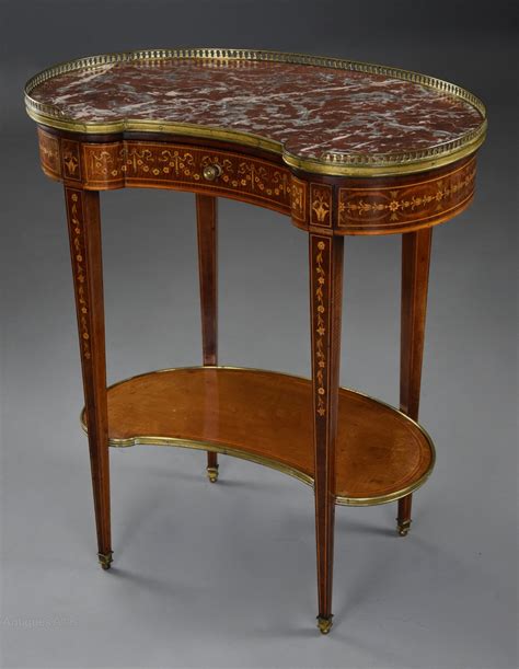 A simple round of glass on a pedestal support, with matching wicker chairs around it. Fine Quality 19thc Kidney Shaped Marble Top Table ...