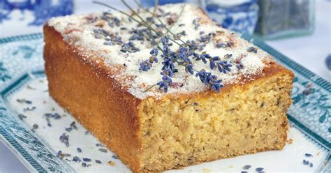 An iconic cake with great texture, flavors and frosting! Lemon and Lavender Drizzle Cake - The Happy Foodie