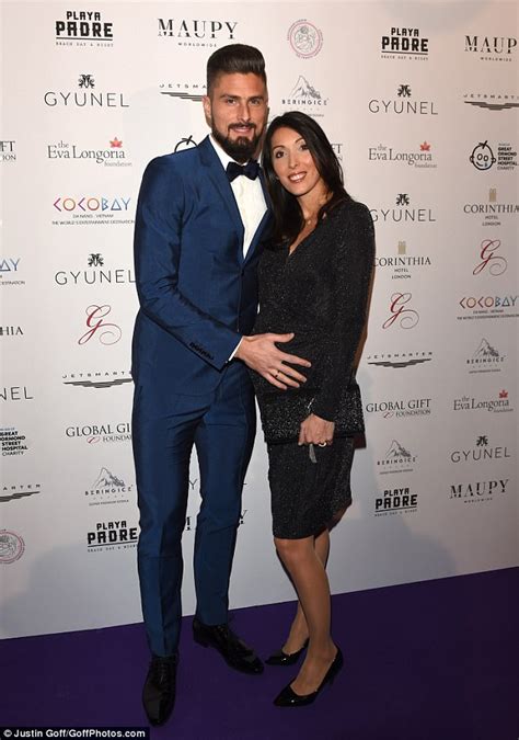 Olivier giroud and wife jennifer attend the global gift gala in partnership with quintessentially on november 19, 2016 at the corithinia hotel in. Arsenal's Olivier Giroud cradles wife Jennifer's stomach ...