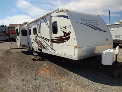 We've detected you are using a browser that is missing critical features. 2012 Passport 3181RE Rear Entertainment Travel Trailer ...