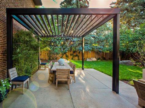 This Cozy Outdoor Space Features A Custom Designed Pergola The Pergola Uses Steel I Beams And