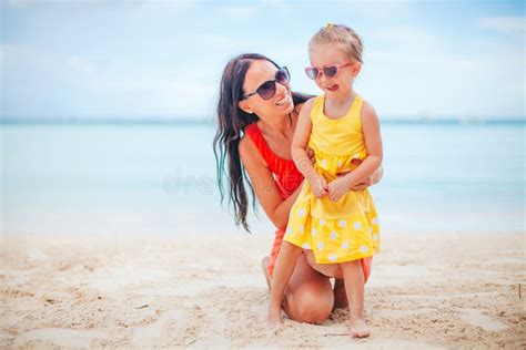 Beautiful Mother And Daughter At The Beach Enjoying Summer Vacation Stock Image Image Of