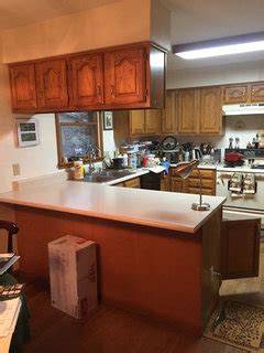 Should I paint my maple cabinets white?