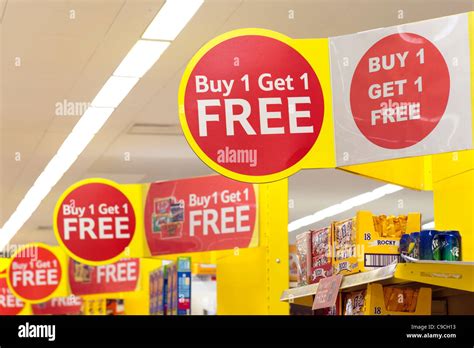 Buy One Get One Free And Special Offers Signs At Tesco Extra