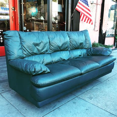 Accessorize with throw pillows in patterns that incorporate the other colors in the. Comfort in Mind | 1980s Dark Green Leather Sofa — Casa ...